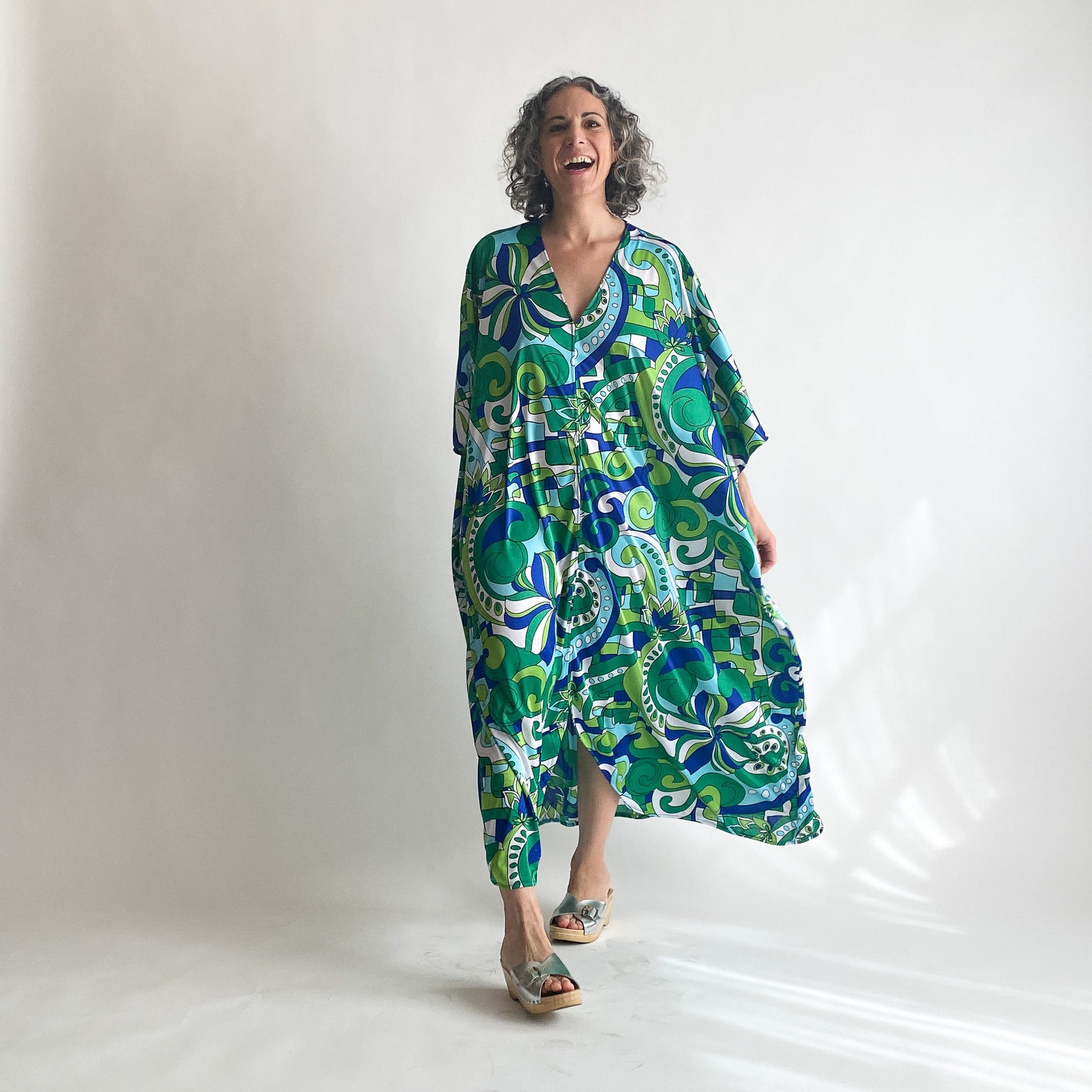 House of Lu Diana Caftan in Color Number 46. A vintage psychedelic blue and green print made of vintage acetate fabric. Perfectly draped and perfectly packable. Only five available. 